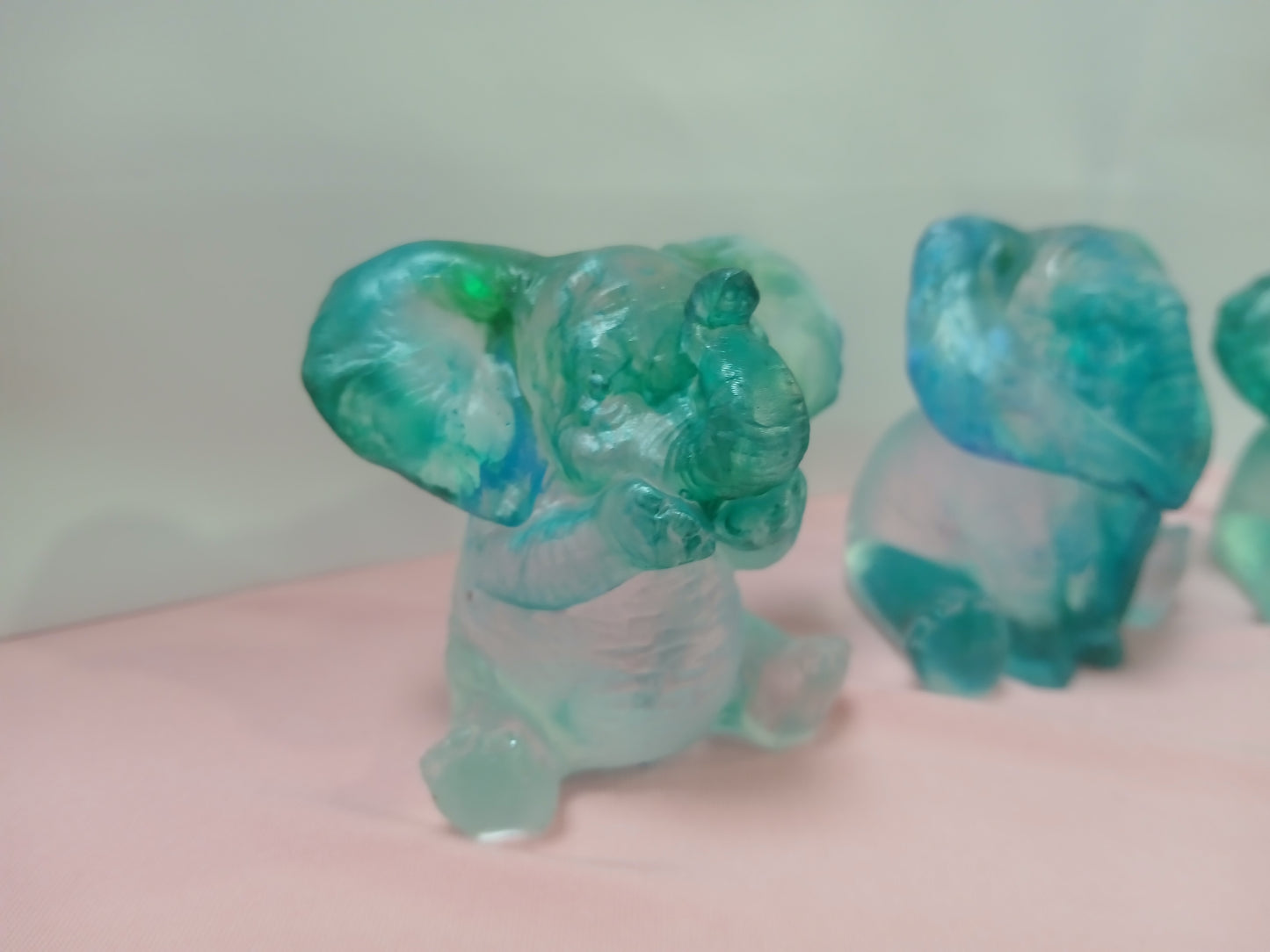 Resin elephants
